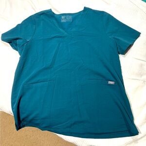 Like new Caribbean Blue scrubs! Never worn but they have been washed.